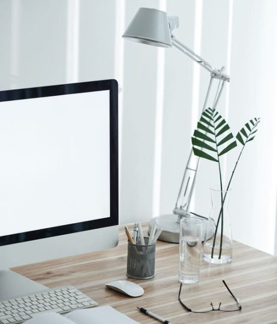 planner-computer-and-glasses-on-table-2025-01-29-07-49-21-utc